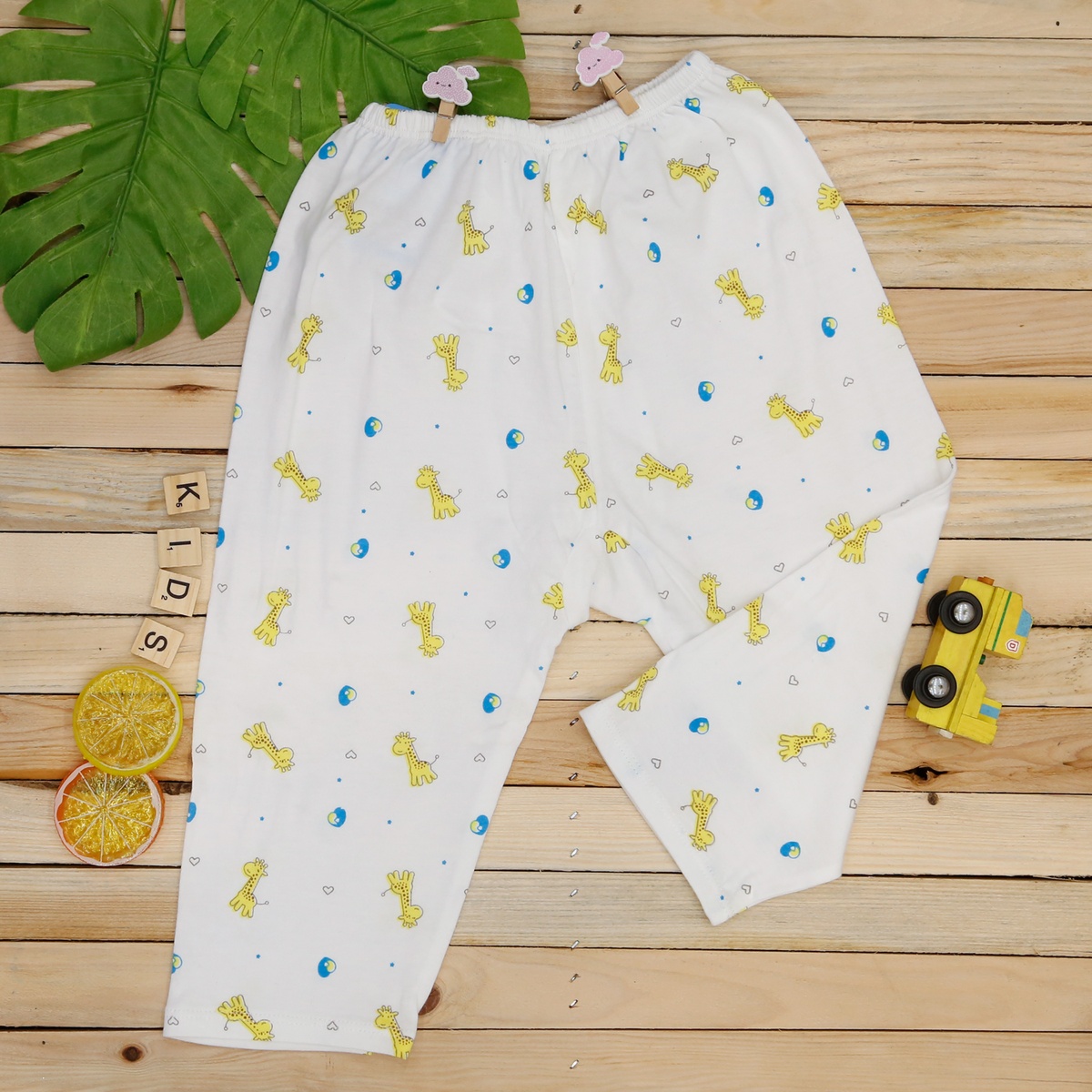 Quần dài sơ sinh Kiza in hình hươu cao cổ 18-24M (Trắng Vàng) - mặt trước