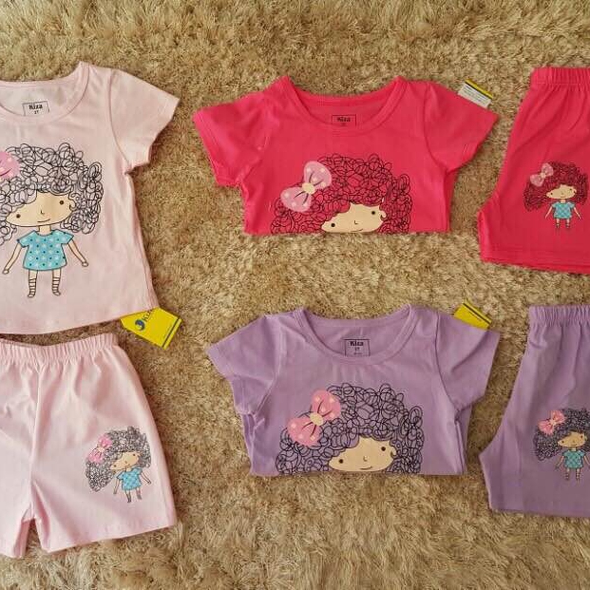 Bộ tay ngắn bé gái Kiza in hình cô bé tóc xù xinh xắn (màu tím) - mặt trái
