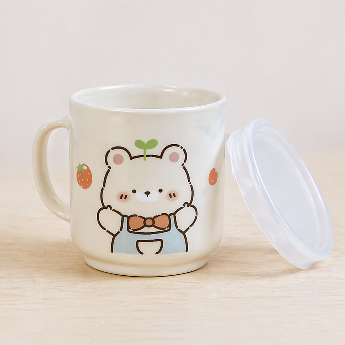 Cốc uống nước cho bé Mamago Cute Bear 100g - mặt trái