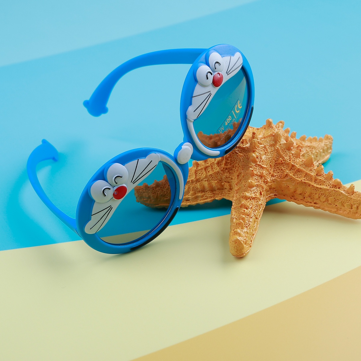 Kính râm thời trang KidsPlaza gọng dẻo 8256 C33 Blue - mặt trái