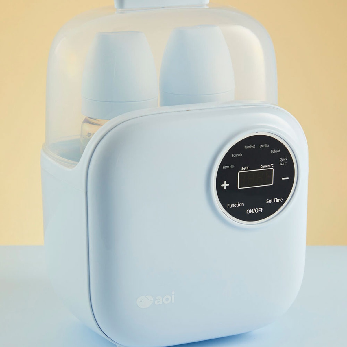 Máy hâm sữa tiệt trùng Aoi Cube - mặt trái
