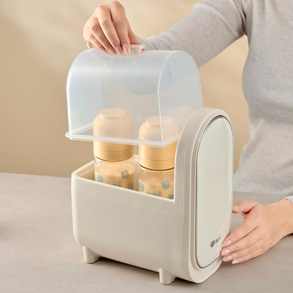 Máy hâm sữa tiệt trùng Aoi Pupa - mặt trái