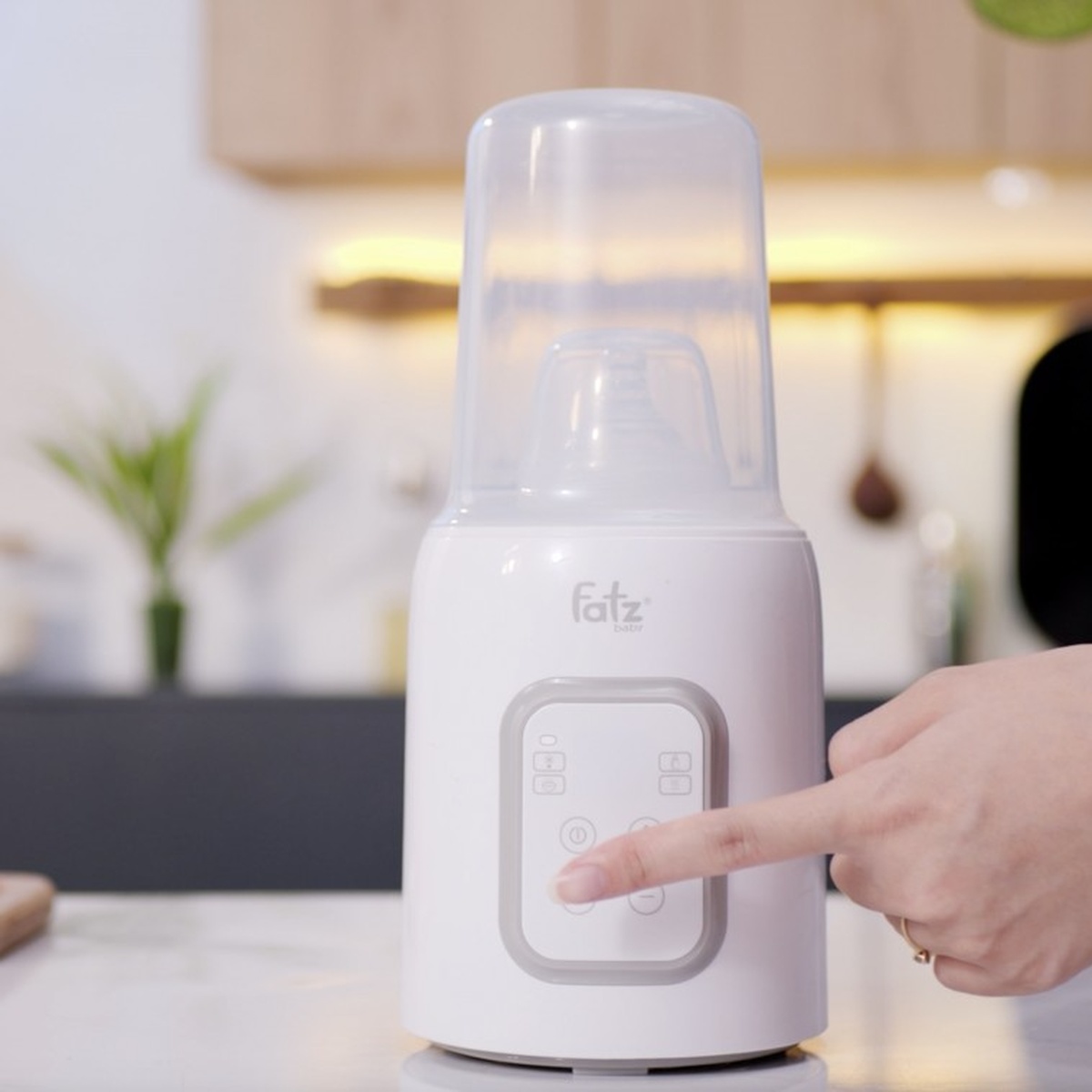 Máy hâm sữa và tiệt trùng Fatzbaby Mono7 FB3010TN - mặt phải