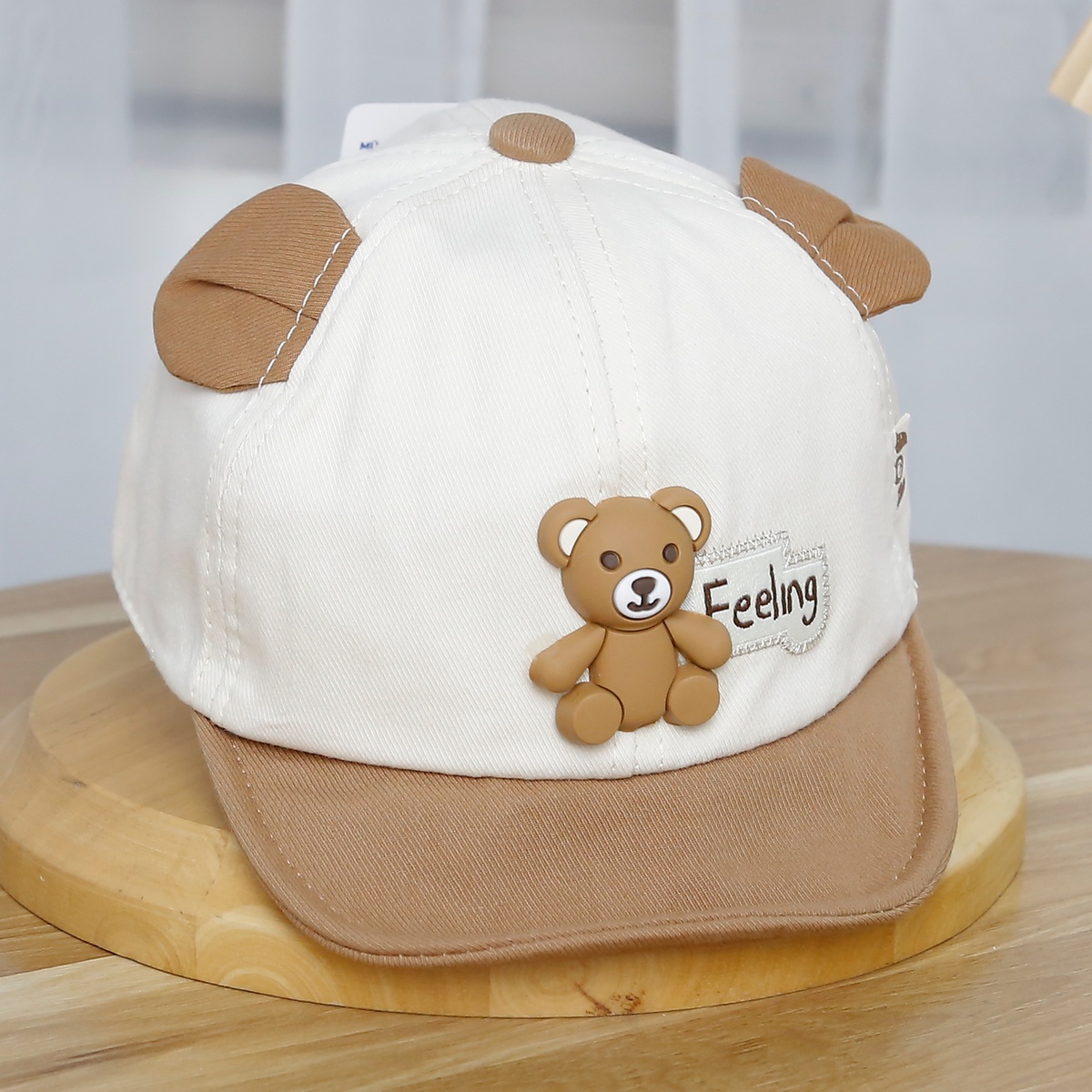 Mũ lưỡi trai KidsPlaza đính gấu 25K-H08 Size 48 (Be) - mặt trái