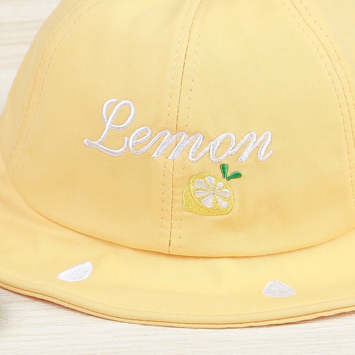 Mũ thời trang Kids Plaza 22K Lemon vàng (2-4Y) - mặt phải