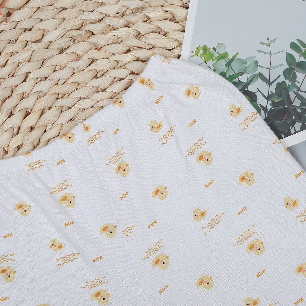 Quần cộc sơ sinh Kiza in gà BA22 (Trắng - vàng) - mặt trái