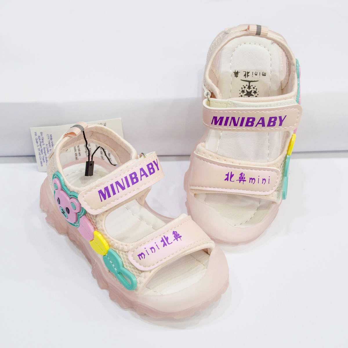 Sandal đính mặt gấu quai hồng AC - mặt sau