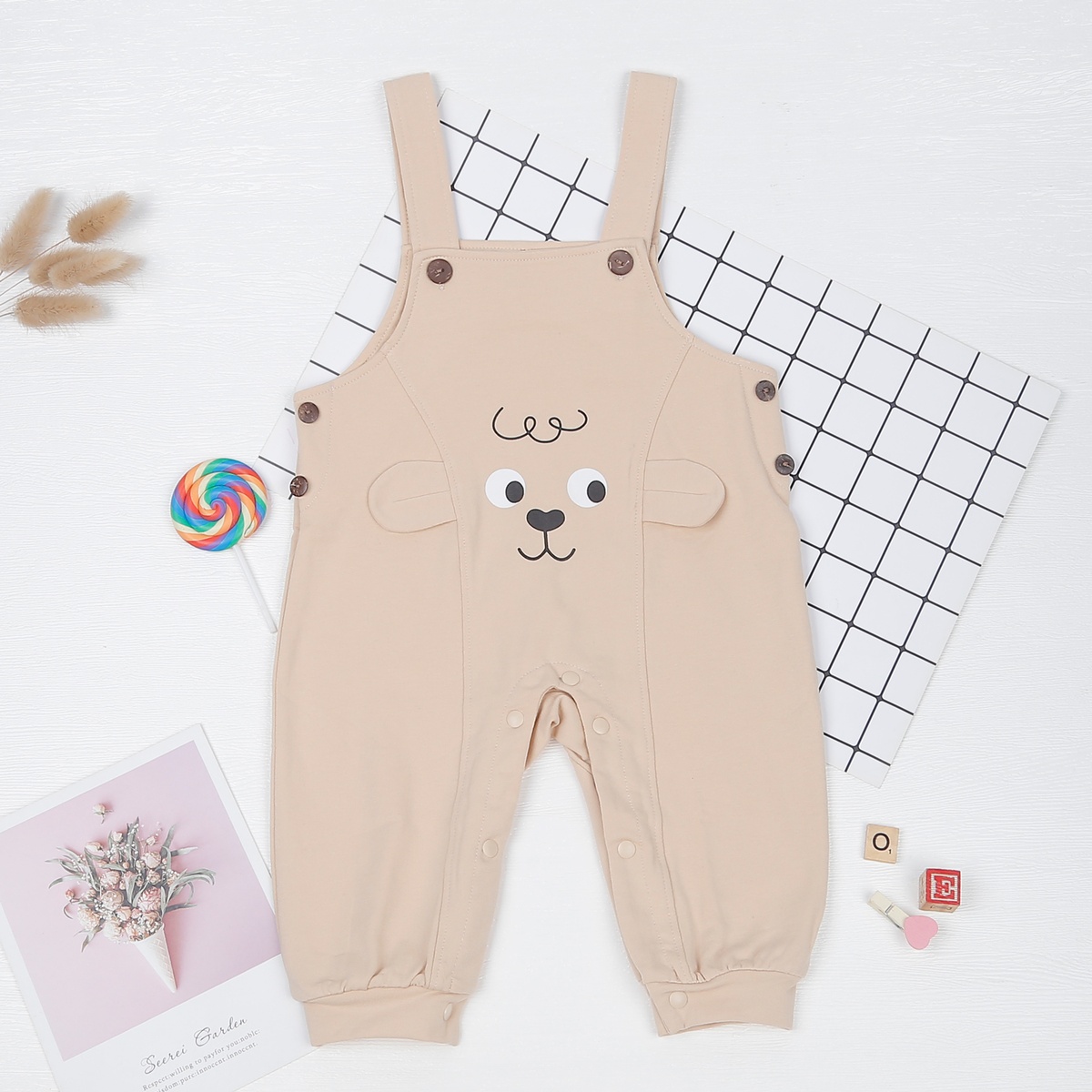 Set yếm bé trai KidsPlaza in gấu kẻ ghi HN22T  - góc nghiêng