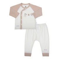 Bộ dài cài lệch KidsPlaza in cún M26H (Trắng be)