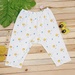 Quần dài sơ sinh Kiza in sư tử (Trắng Cam) 9-12M - mặt trước