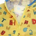 Áo gió KidsPlaza in hình Chữ Cái 3Y M20T (Vàng) - mặt phải