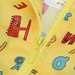 Áo gió KidsPlaza in hình Chữ Cái 3Y M20T (Vàng) - mặt sau
