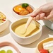 Bát ăn dặm có đế hút kèm nắp silicone Moyuum (Trắng đỏ) - mặt phải