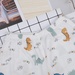 Bộ quần áo bé trai cộc tay KidsPlaza kẻ in khủng long M22H - hình 7