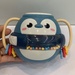 Đồ chơi xúc xắc chim cánh cụt có đèn CY.HY-626 - mặt trái