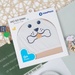 Mũ sơ sinh kẻ tăm KidsPlaza hình chó ND22T (Trắng be) - góc nghiêng