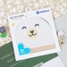 Mũ sơ sinh kẻ tăm KidsPlaza hình gấu ND22T (Trắng be) - góc nghiêng