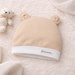 Mũ sơ sinh cho bé KidsPlaza tai gấu ND26H (Trắng be) - mặt trước
