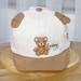 Mũ lưỡi trai KidsPlaza đính gấu 25K-H08 Size 48 (Be) - mặt trước