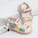 Sandal đính mặt gấu quai hồng AC - mặt trước