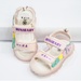Sandal đính mặt gấu quai hồng AC - mặt trái