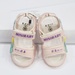 Sandal đính mặt gấu quai hồng AC - mặt phải