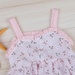 Set váy 2 dây hoa băng đô KidsPlaza HN22H hồng - mặt phải