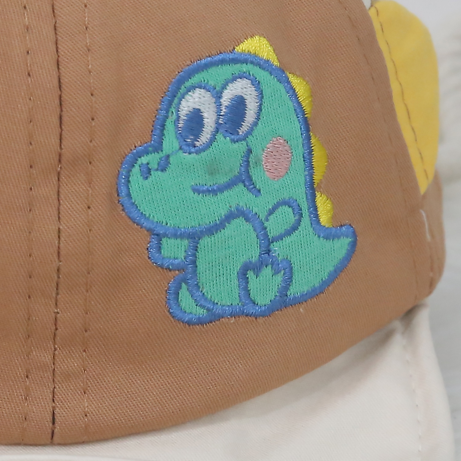 Mũ lưỡi trai thời trang in khủng long KidsPlaza 24K-H12 S48 (Màu nâu)