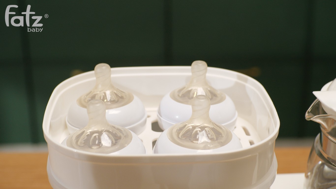 Máy đa năng điện tử tiệt trùng, hâm sữa, nấu cháo, đun nước Multimax 2 Plus FatzBaby FB9025SL hình 2