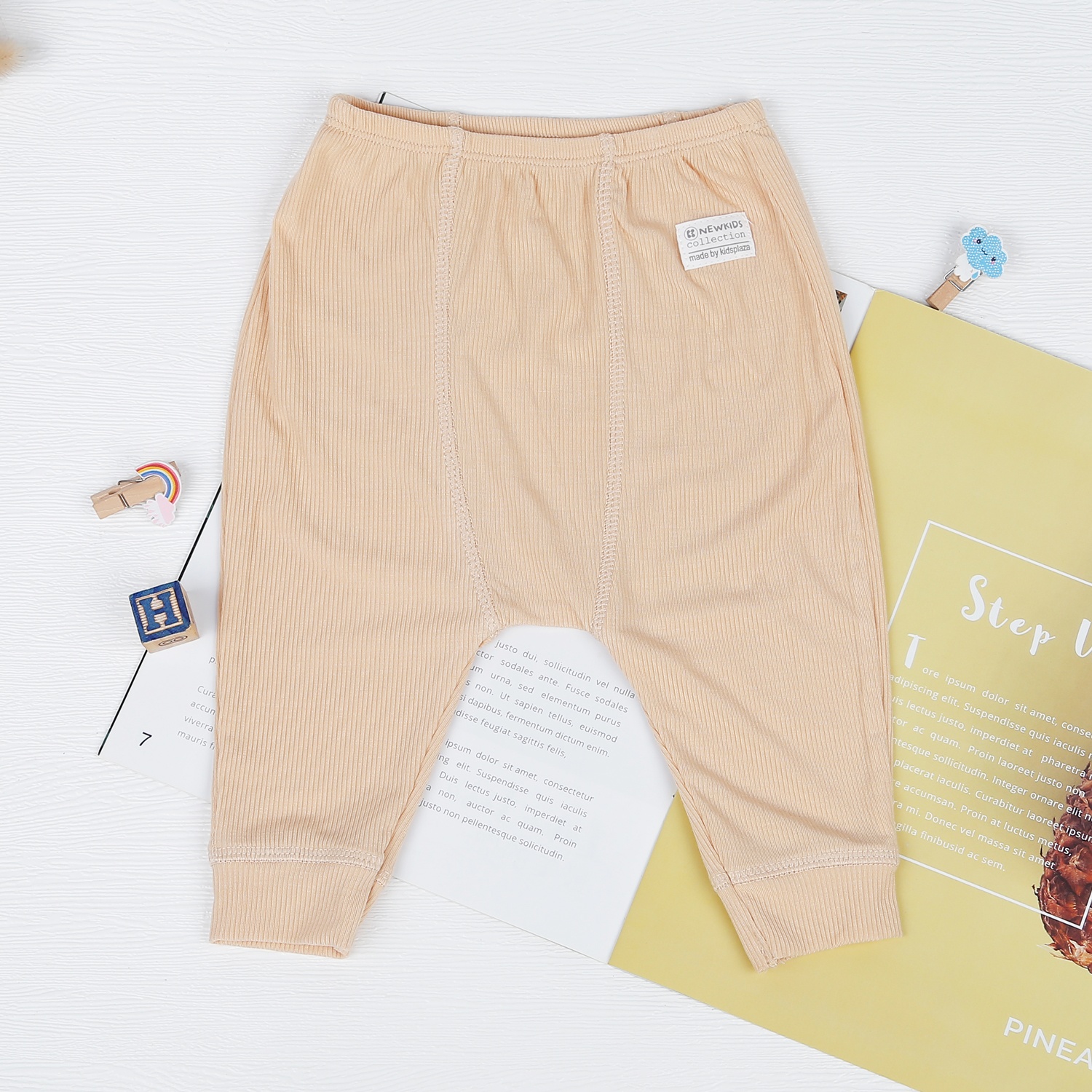 Bộ sơ sinh dài tay cài lệch kẻ tăm KidsPlaza in gấu ND22T (Be) hình 6