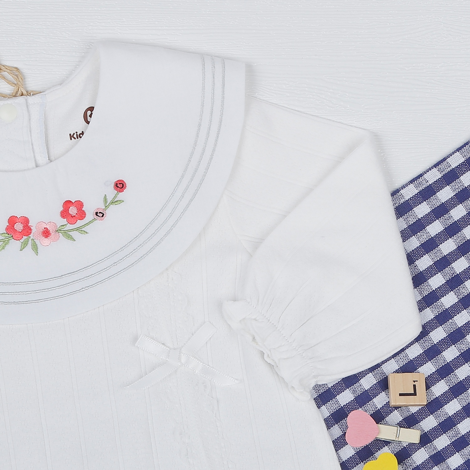 Body bé gái ren đính nơ KidsPlaza HN22D (trắng) hình 3