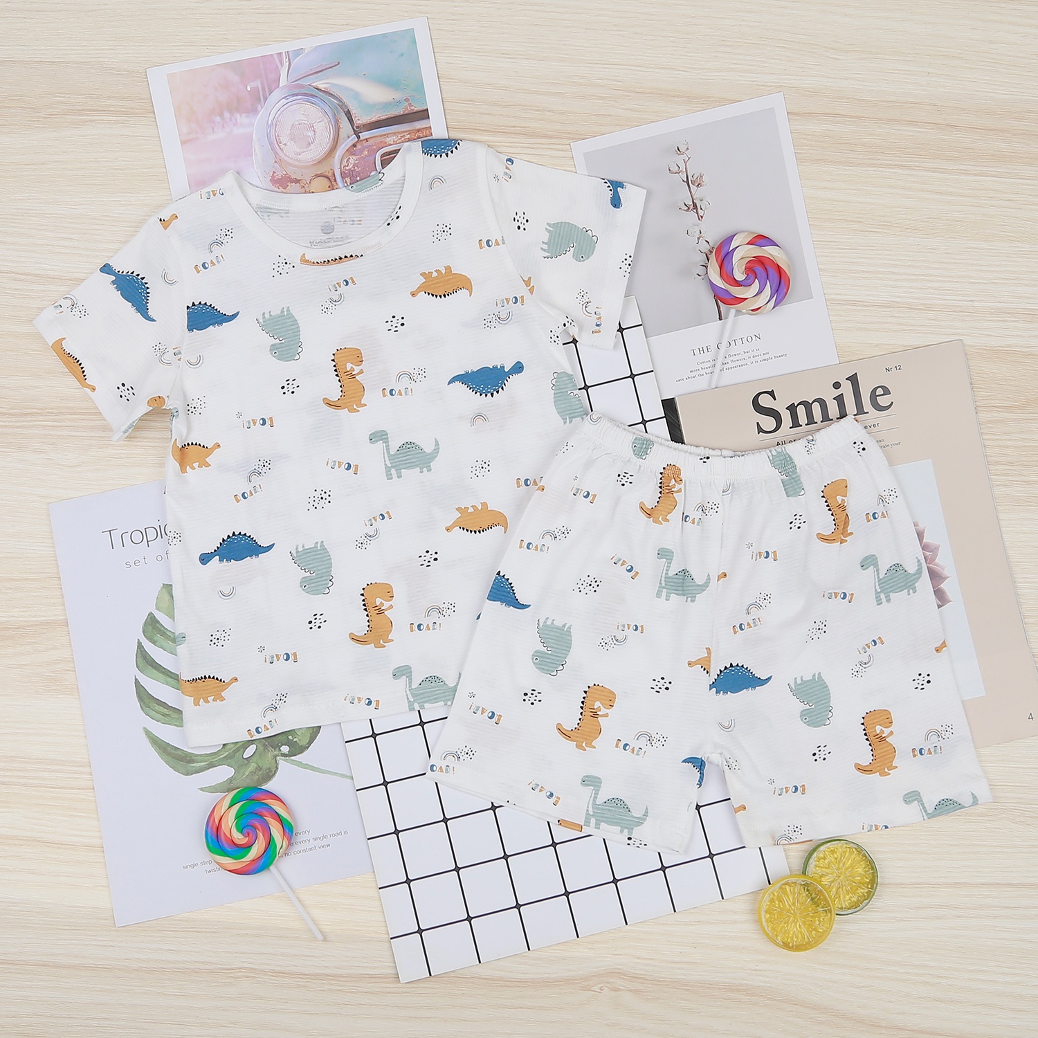 Bộ quần áo bé trai cộc tay KidsPlaza kẻ in khủng long M22H hình 1