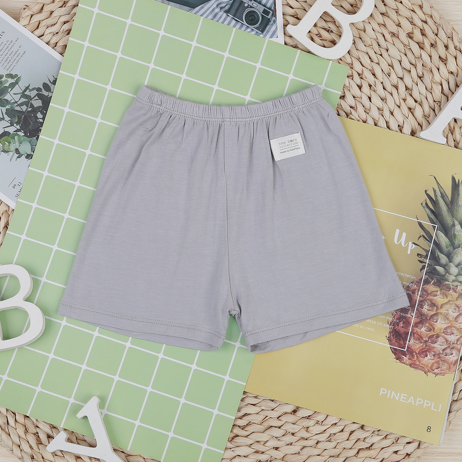 Bộ quần áo cộc tay cài giữa KidsPlaza in gấu M22H (Ghi) hình 6