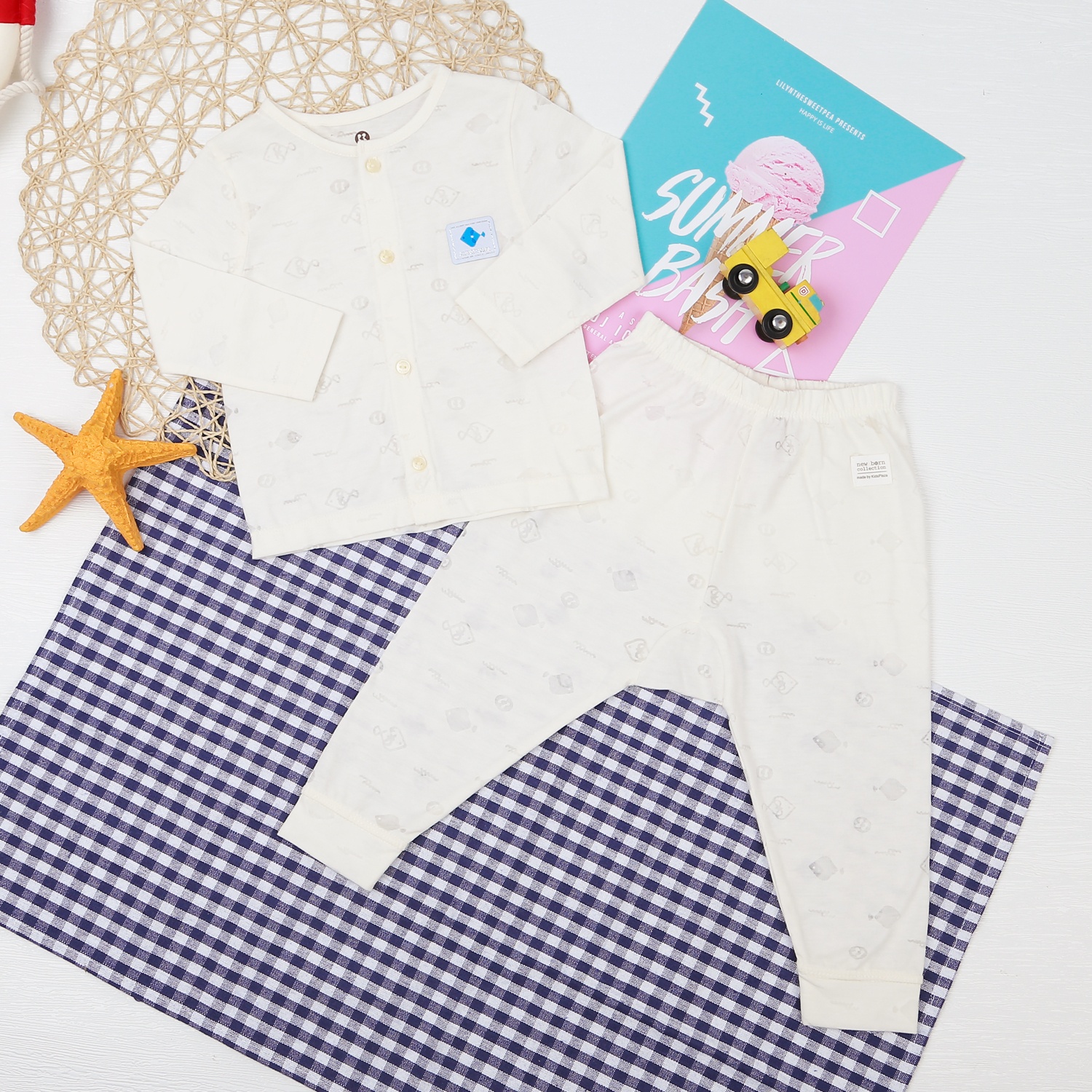  Bộ quần áo dài tay cài giữa KidsPlaza in cá HN21T (Vàng) hình 1