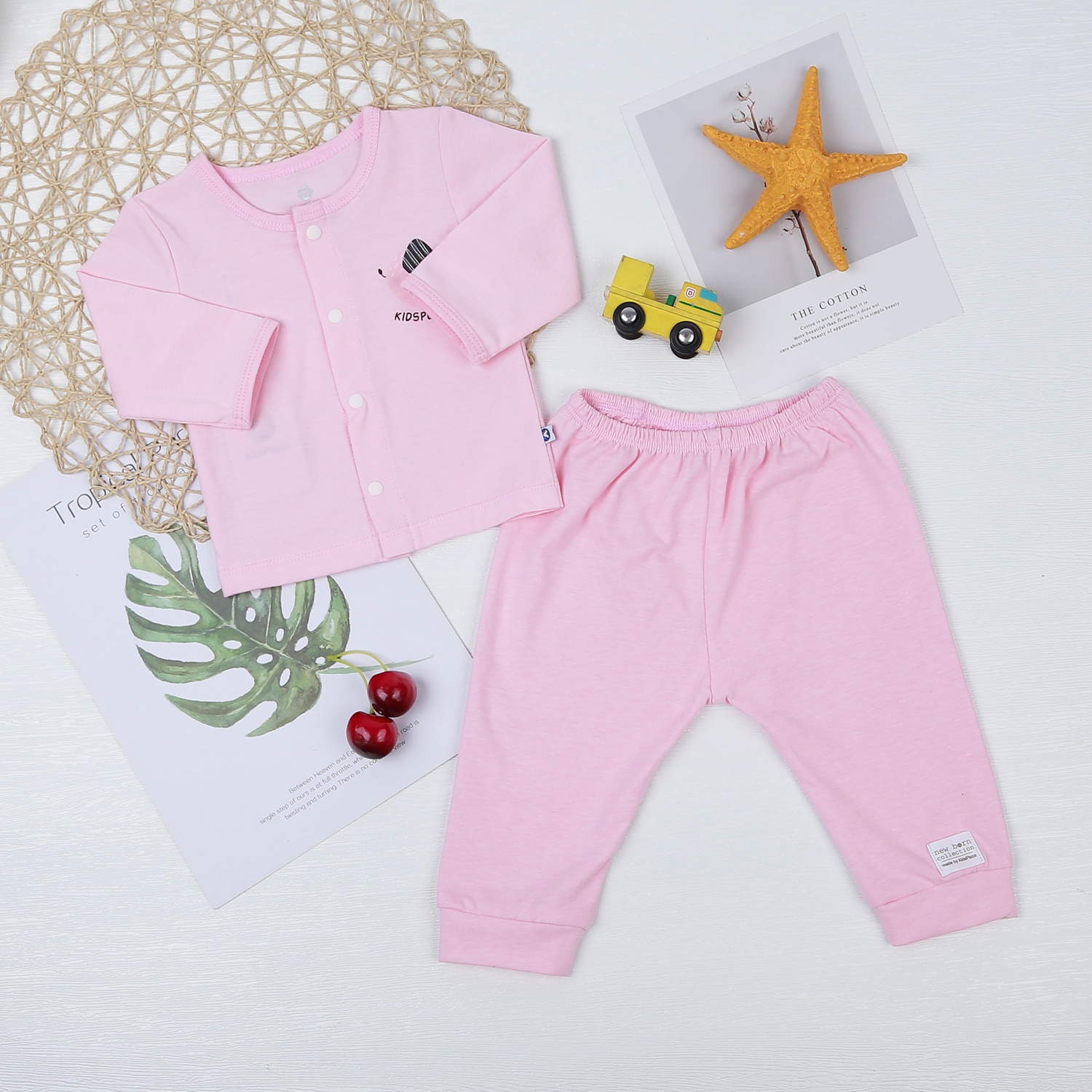 Bộ quần áo dài tay cài giữa KidsPlaza KA22 (Hồng) hình 1