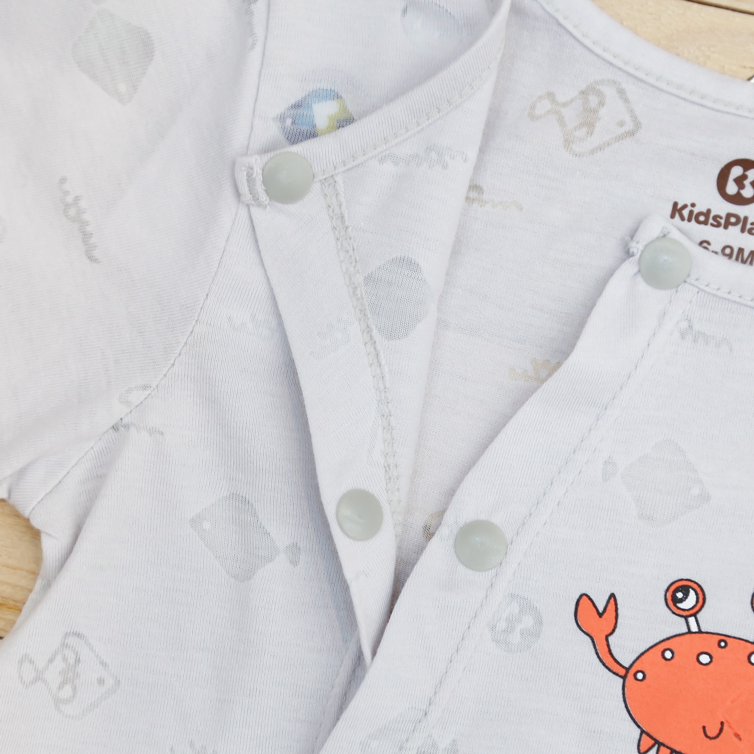 Body sơ sinh cộc tay cho bé in cua KidsPlaza HN21H (Ghi) hình 3
