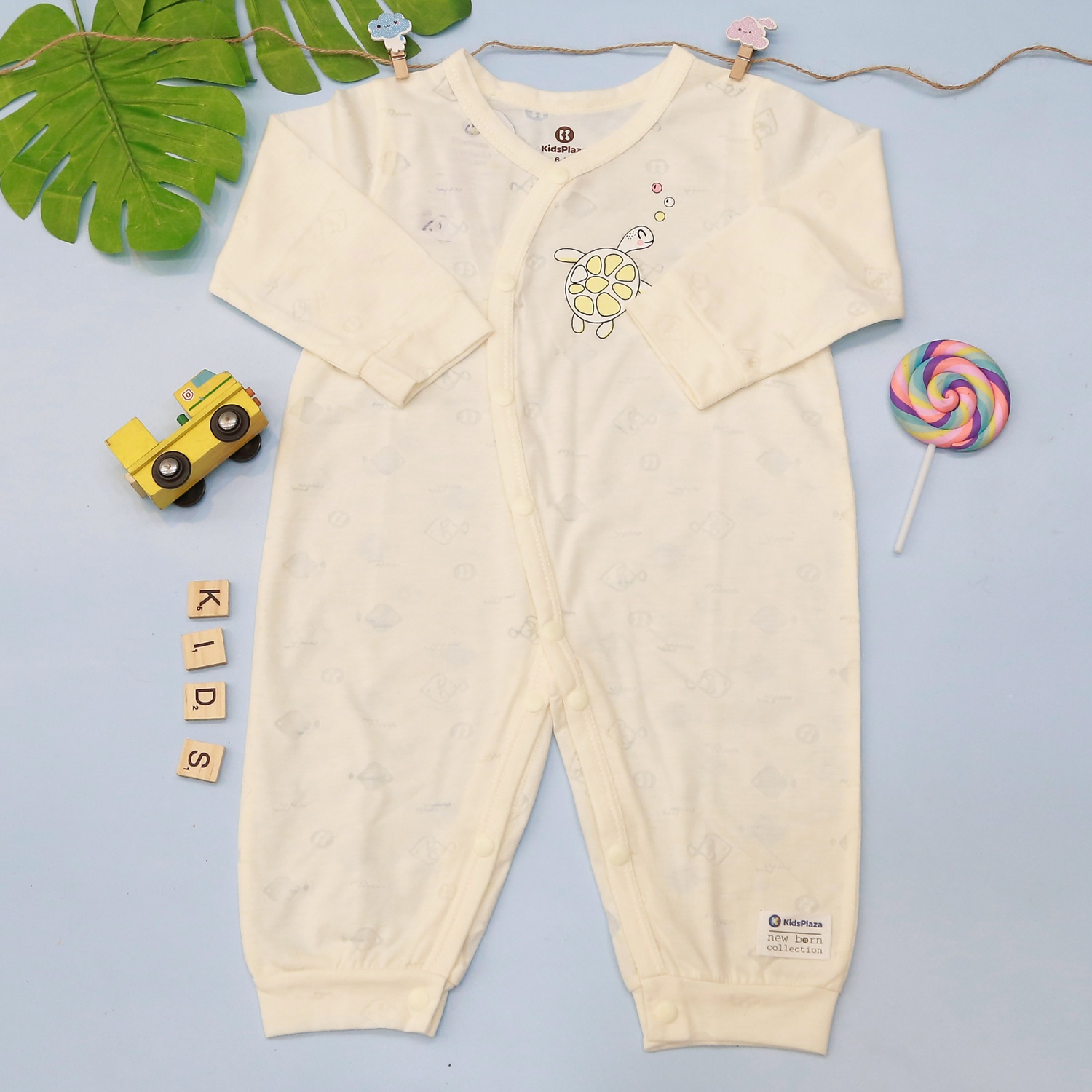 Body sơ sinh dài tay KidsPlaza in rùa HN21T (Vàng) hình 1