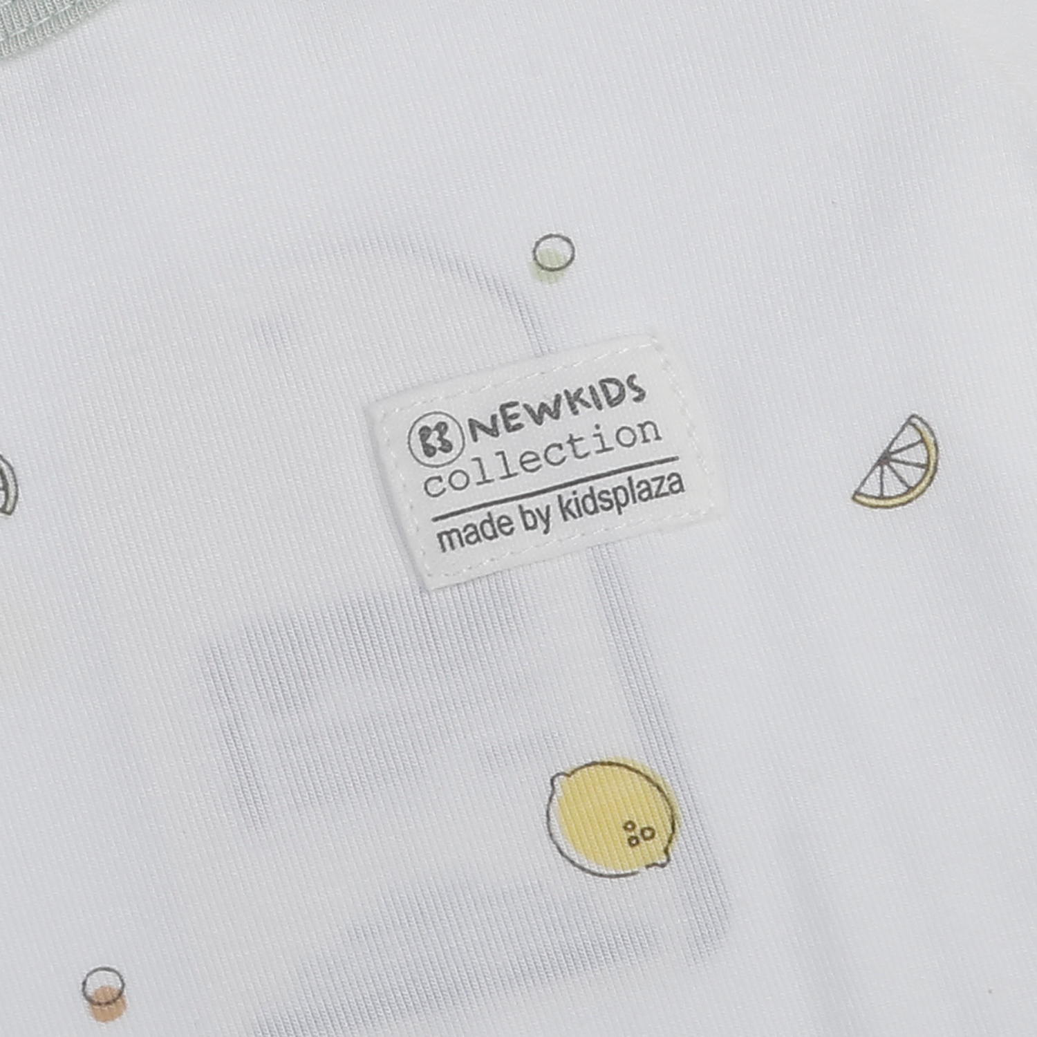 Body dài cài lệch KidsPlaza Otis in chanh ND25T (Trắng) hình 2