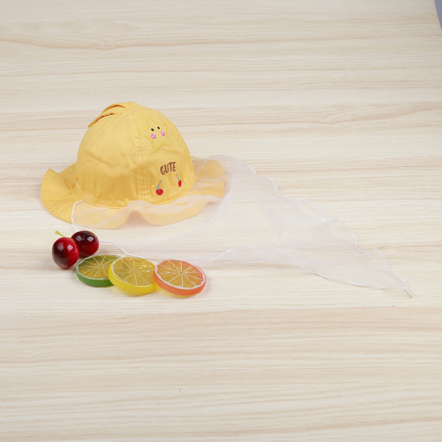 Mũ vành tròn bé gái KidsPlaza phủ voan hoạ tiết cute DN22H (Vàng) hình 1