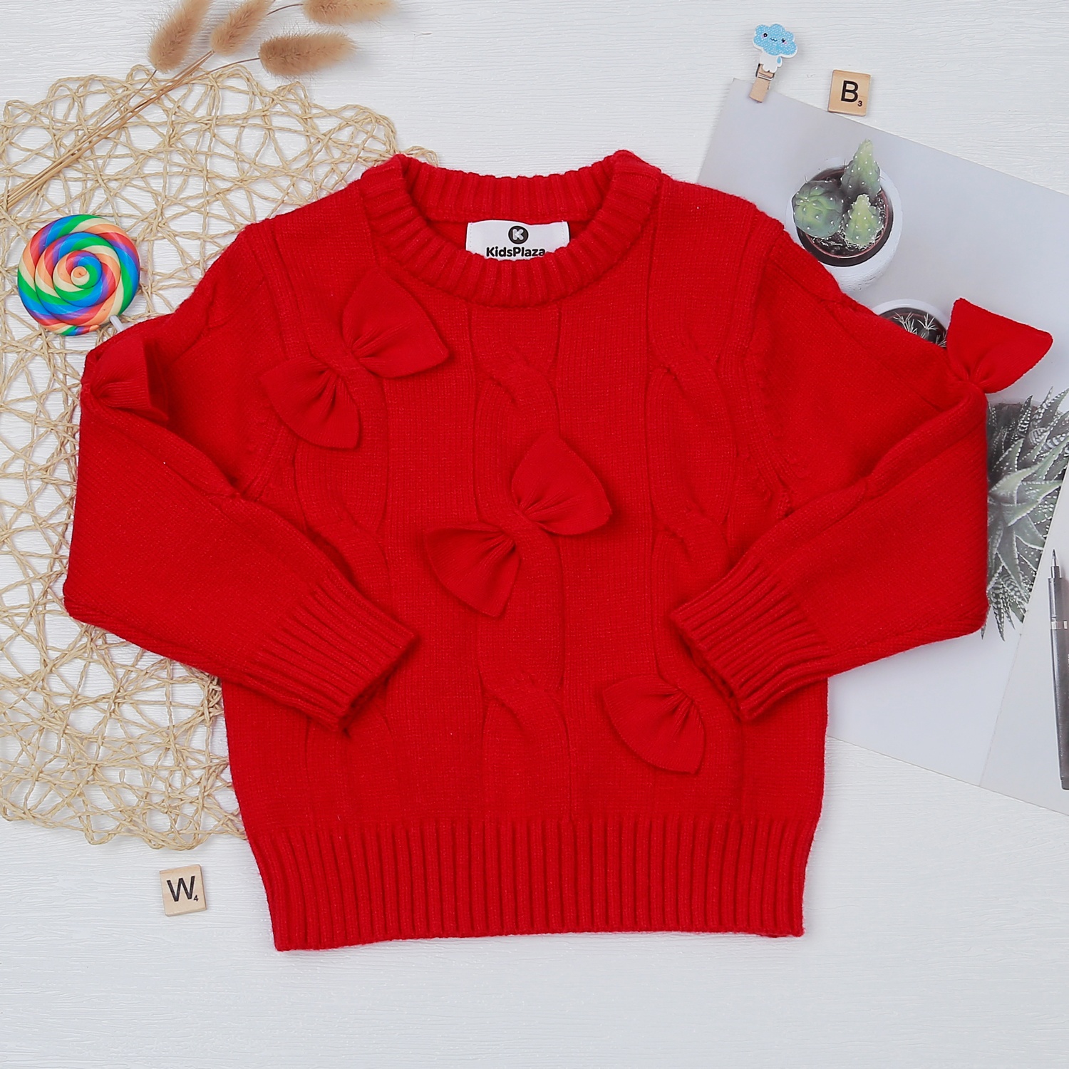 Áo len bé gái dài tay KidsPlaza gắn nơ đỏ HN22D  hình 1