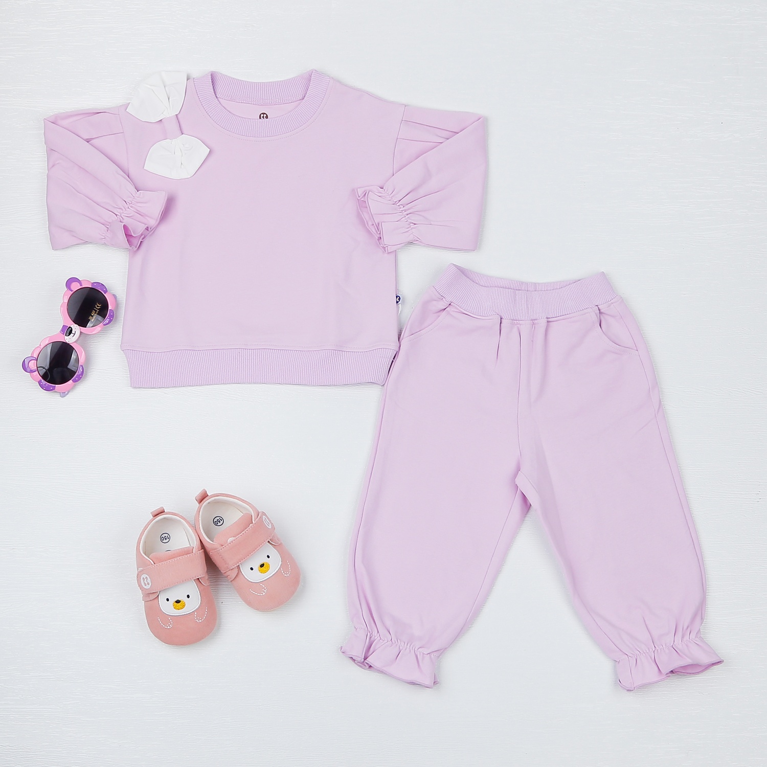 Bộ quần áo bé gái dài tay KidsPlaza nơ vai tay bồng HN22D (Tím) hình 1