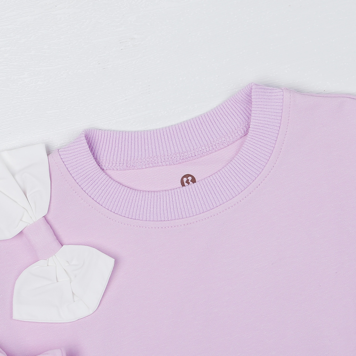 Bộ quần áo bé gái dài tay KidsPlaza nơ vai tay bồng HN22D (Tím) hình 3