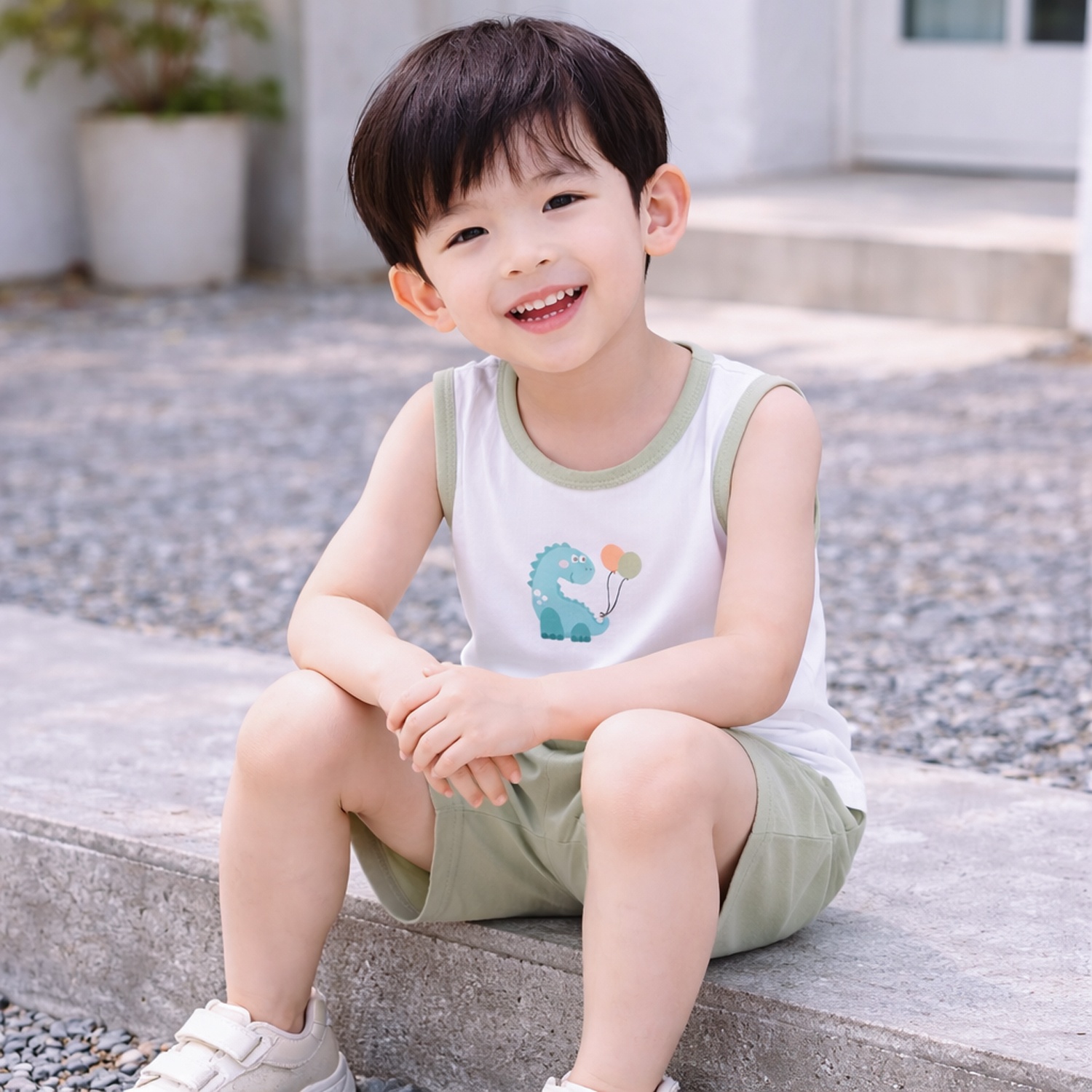 Bộ ba lỗ bé trai KidsPlaza rayon in khủng long M26H (Trắng xanh) hình 3