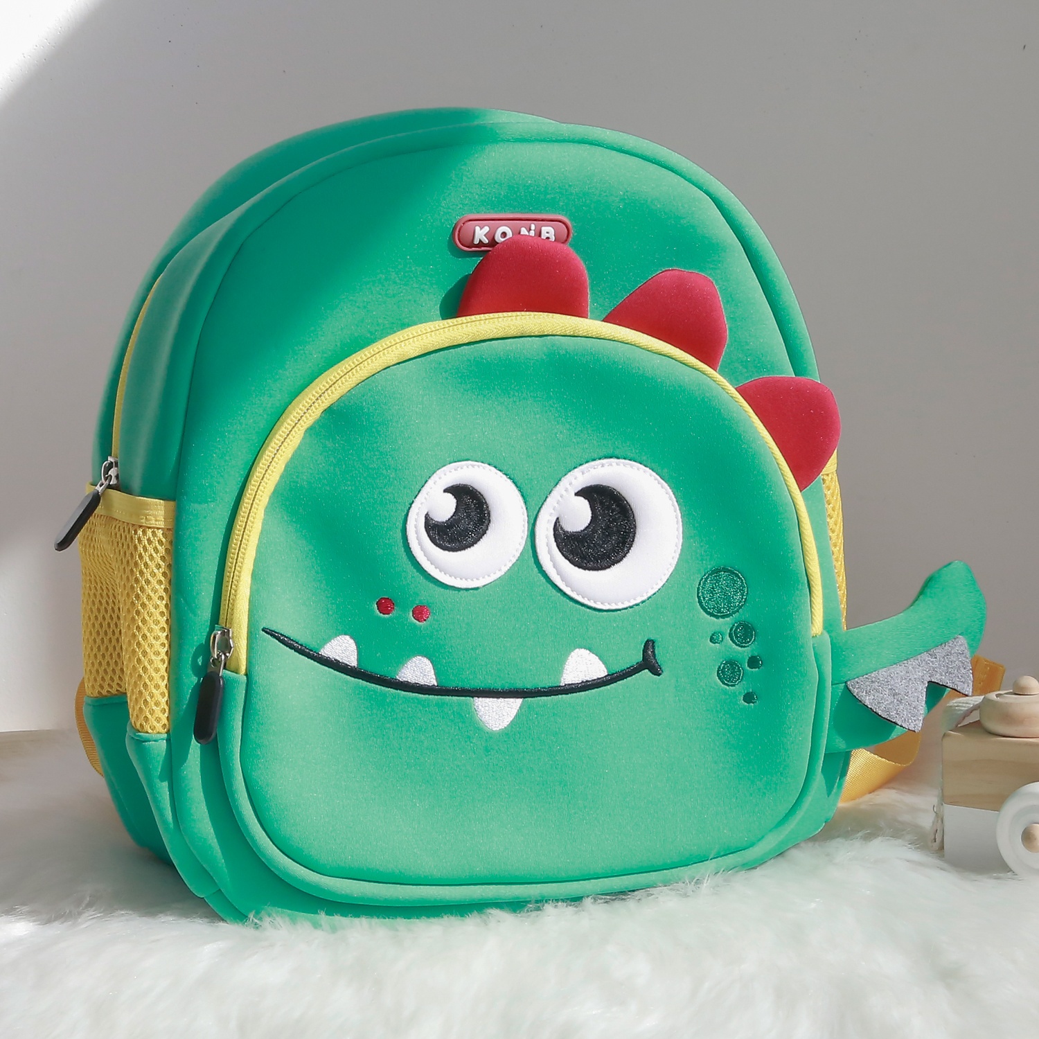 Balo trẻ em KAQINOBE hình khủng long cute (Xanh) hình 1