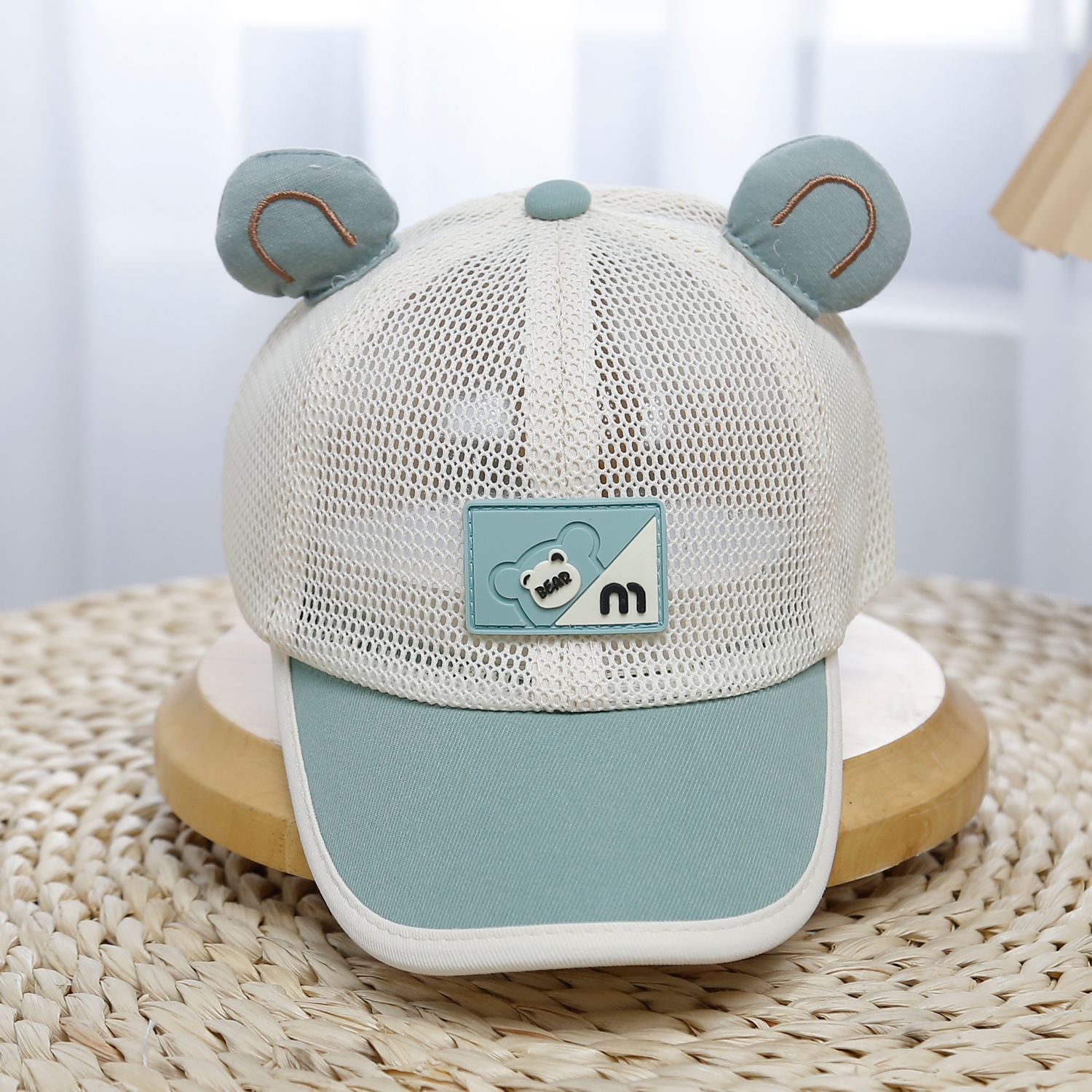 Mũ lưỡi trai KidsPlaza lưới 2 tai 25K-H26 Size 50 (Xanh) hình 1