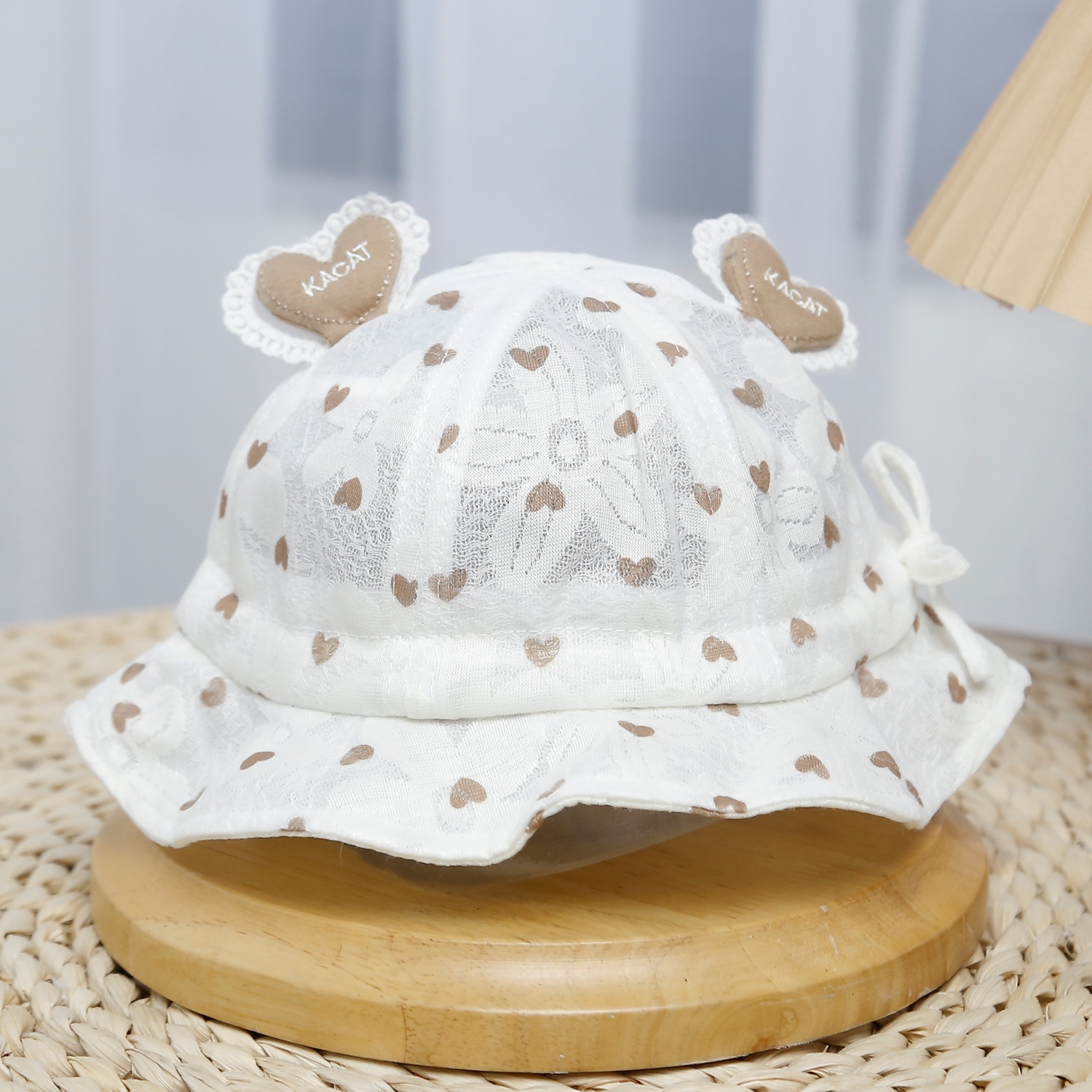 Mũ thời trang KidsPlaza đính 2 trái tim 25K-H17 Size 48 (Nâu) hình 1