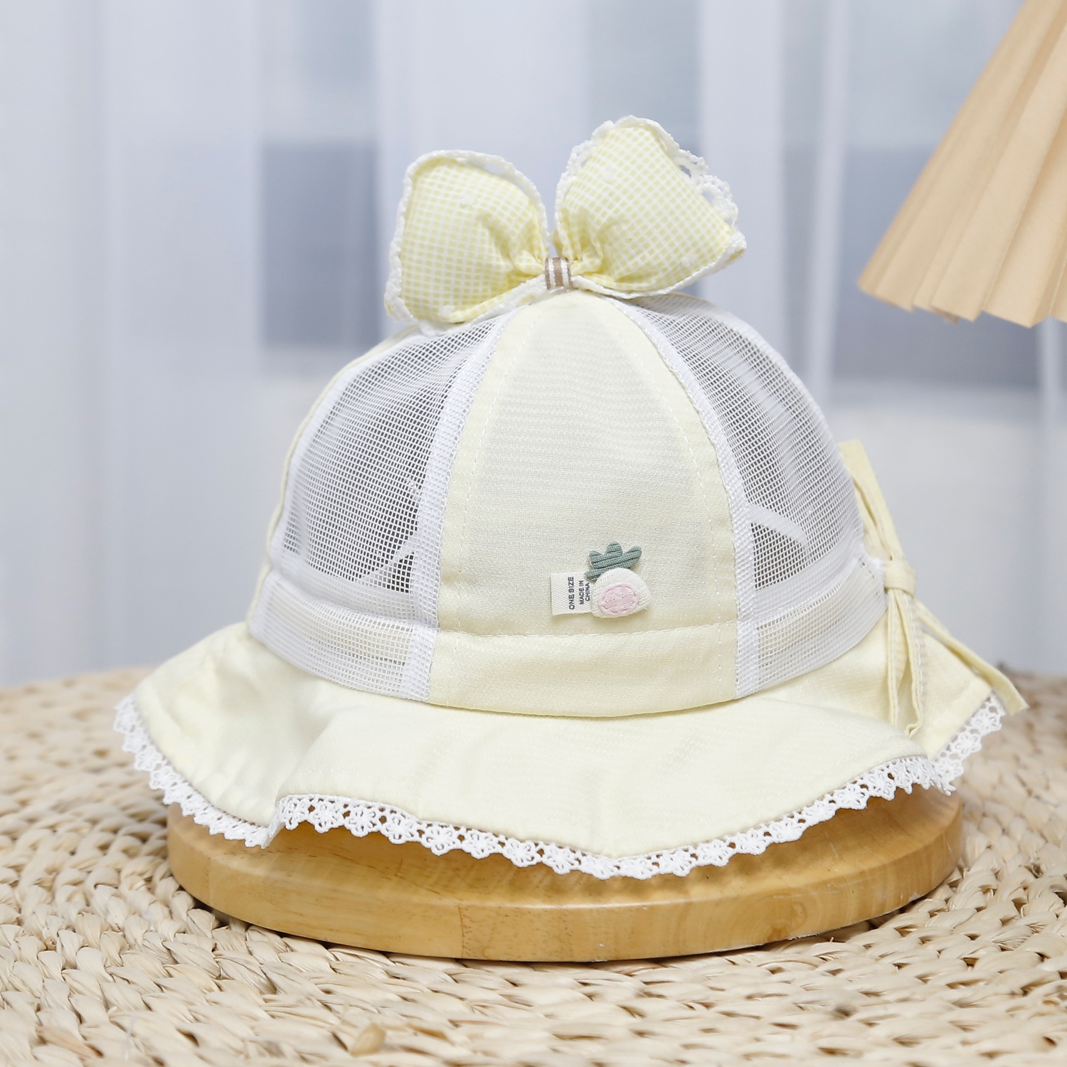 Mũ thời trang KidsPlaza đính nơ 25K-H18 Size 48 (Vàng) hình 1