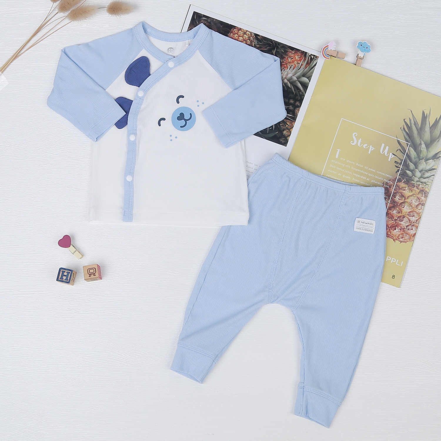 Bộ sơ sinh dài tay cài lệch kẻ tăm KidsPlaza ND22T (trắng xanh) hình 1